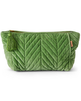 House of Holabox pesto green velvet toiletry bag with quilted chevron pattern, zip closure, and decorative tassel.
