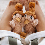 House of Holabox and the little dog laughed Mini Petunia Duck plush toys wearing brown knit pom-pom hats
