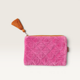 House of Holabox pink quilted velvet cosmetics purse with a matching tassel zip pull.