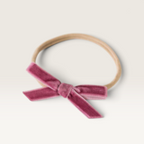 House of Holabox Snuggle Hunny baby headband featuring a dusty pink velvet petite bow on a soft stretch nylon band.