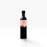 House of Holabox Sticky Balsamic Premium Pomegranate glaze in a 250ml bottle with a pink label and gold medal seal.