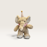 House of Holabox Priscilla Elephant soft toy in caramel plush with a pink gingham frill and chocolate party hat