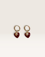 House of Holabox Jules heart earrings featuring red enamel charms on 18K gold-plated hoop bases.