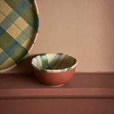 House of Holabox Robert Gordon Cinnamon Christmas stoneware condiment bowl with earthy checked pattern on a shelf