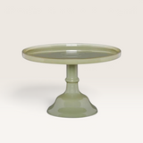 House of Holabox Ecology Torte glass cake stand in a glossy milky sage green finish with a classic stemmed base.