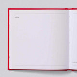 House of Holabox Santa Letters journal with red cover and blank lined pages for writing Christmas letters to Santa.