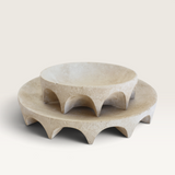 House of Holabox Arcus scalloped cement table trays in a neutral matte finish with a sculptural design.
