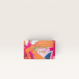 House of Holabox Wild Emery x Morgan Jamieson shower steamer box with vibrant abstract art and thinking of you text.