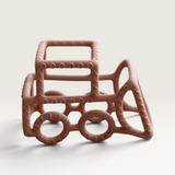 House of Holabox silicone bulldozer teether in dusty rose for soothing teething relief
