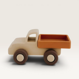 House of Holabox Henry & Flo soft silicone toy truck in beige and brown, perfect for imaginative toddler play.
