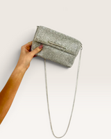 House of Holabox Marie silver glomesh party crossbody bag with a metallic finish and adjustable chain strap