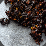 House of Holabox Somage 9 Spice Honey Fresh Chai blend featuring dark Ceylon black tea leaves and organic spices.