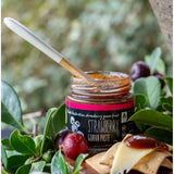 Port Willunga Strawberry Guava Paste 125g glass jar on cheese board with crackers and nuts