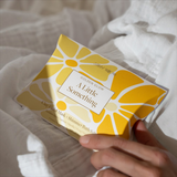 House of Holabox Stray Willow Golden Glow self-care gift set with facial mask and bath salts in yellow packaging.