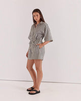 House of Holabox Ingrid tie waist playsuit in a black and white striped cotton blend with a collared neckline.