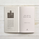 House of Holabox book The Art Of Who We Are by Robert W. Dean, open page showing author bio and title on textured paper