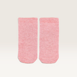 House of Holabox Toshi organic cotton baby ankle socks in a soft pink melange knit for infants aged 0-6 months.