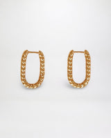 House of Holabox Jordan gold-plated twisted hoop earrings with a textured finish and secure clip closure.