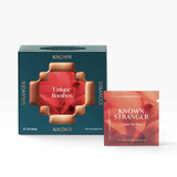 House of Holabox Known Stranger Unique Rooibos tea box and single sachet with floral red and green packaging