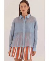 House of Holabox Val oversized shirt in pale blue lyocell-blend with a collared neckline and button-through front.
