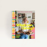 House of Holabox What Can I Bring cookbook cover featuring author Sophie Hansen holding a tray of baked food