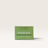 House of Holabox Wild Emery Energize shower steamer in a green box with lemongrass and ylang ylang scent