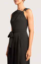 Black Jasmine front pleat jumpsuit featuring a sleeveless silhouette and a polished gold buckle shoulder detail.