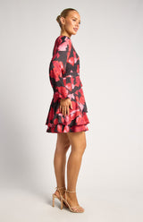 Faith Floral Mini Dress in red and black with long sleeves and a layered ruffle hem.