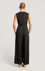 Back view of the black Jasmine sleeveless jumpsuit featuring a tailored fit and wide-leg silhouette.