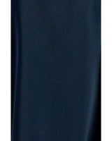 Close-up of the navy blue fabric texture of the Belle Wrap Dress featuring a smooth, soft-touch finish.
