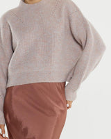 Pink marle wool-blend pointelle jumper with a relaxed fit, dropped shoulders, and wide ribbed neckline.