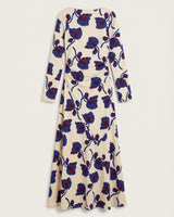Cream jersey midi dress with a blue and burgundy floral print, boat neckline, long sleeves, and gathered waist detail.