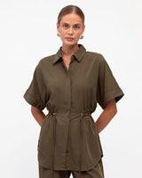 Olive green cotton-blend drawstring shirt with a collared neckline, short sleeves, and a flattering cinched waist.