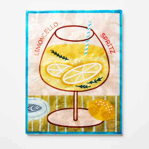 Decorative towel with a lemon-themed cocktail design on a white background