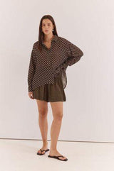 Relaxed fit, long-sleeve Joy Shirt in brown with white polka dots, crafted from lightweight, breathable viscose.