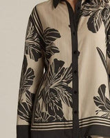 June collared shirt in beige with black floral print, contrast trim, and button-down front in soft lyocell fabric.