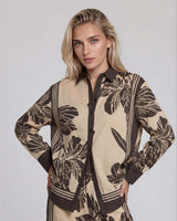 June Collared Shirt in a beige and brown floral print with contrast trim, classic collar, and relaxed lyocell fit.