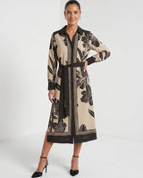June midi shirt dress in beige and black floral print with a classic collar, contrast trim, and waist tie.