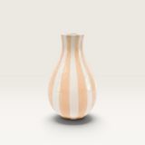 House of Holabox Urban Products Kegan ceramic vase featuring a playful peach and white vertical striped pattern.