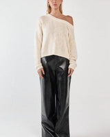 Cream-colored 100% cotton knit sweater featuring a relaxed silhouette and a stylish asymmetric neckline.