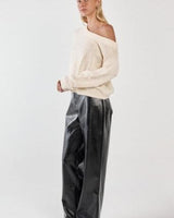 Cream 100% cotton textured knit sweater featuring a relaxed fit and stylish asymmetric off-the-shoulder neckline.