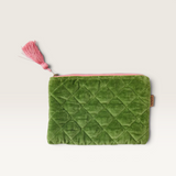 Kip&Co quilted moss green velvet cosmetics purse with a contrasting pink tassel zip closure.