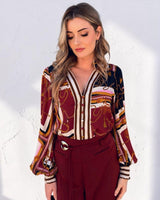 Lauren Blouse in a long-sleeve rayon print with a V-neck, button-down front, and gold chain-link pattern.