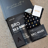 Handsome Devil man self-care gift box with face mask, cooling eye gels, wax cologne, cold brew coffee, premium socks, and Father's Day card