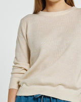 Cream Morris sweater in a soft knit with a classic crew neckline, relaxed fit, and ribbed cuffs and hem.