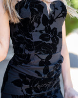 Black Nia maxi dress in floral burnout fabric with a sweetheart neckline and front rouching detail.