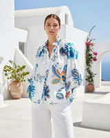 Cerese blue botanical print linen blend shirt with mandarin collar and 3/4 smock cuff sleeves.