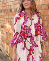 Novara linen-blend dress with a pink and red floral print, button-through front, and removable waist tie.