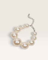House of Holabox Becoming Pearl Bracelet with graduated faux pearls and a silver-tone platinum-plated extender chain.