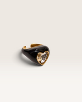 House of Holabox Lucky Charm ring featuring a midnight black enamel finish and a clear faceted heart crystal stone.